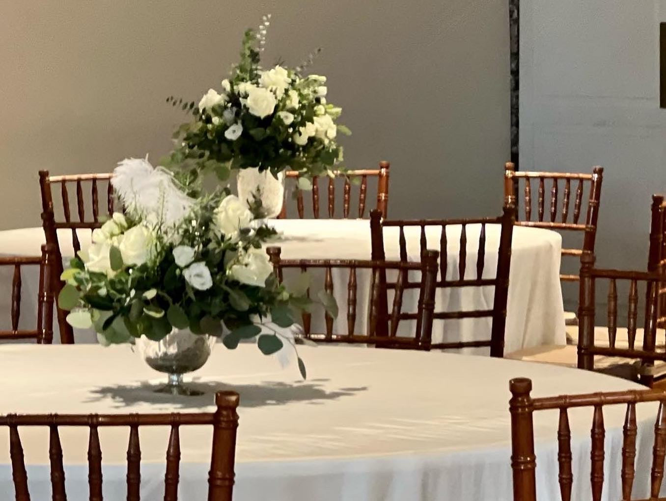Event florals in Charleston. Beautiful white flower arrangements for elopement. Party centerpieces.